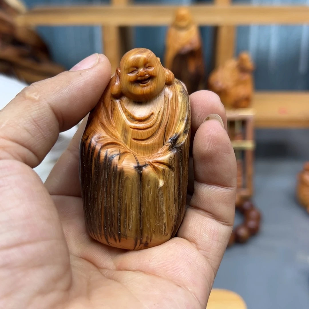 3***℃木崖柏木摆件手把件