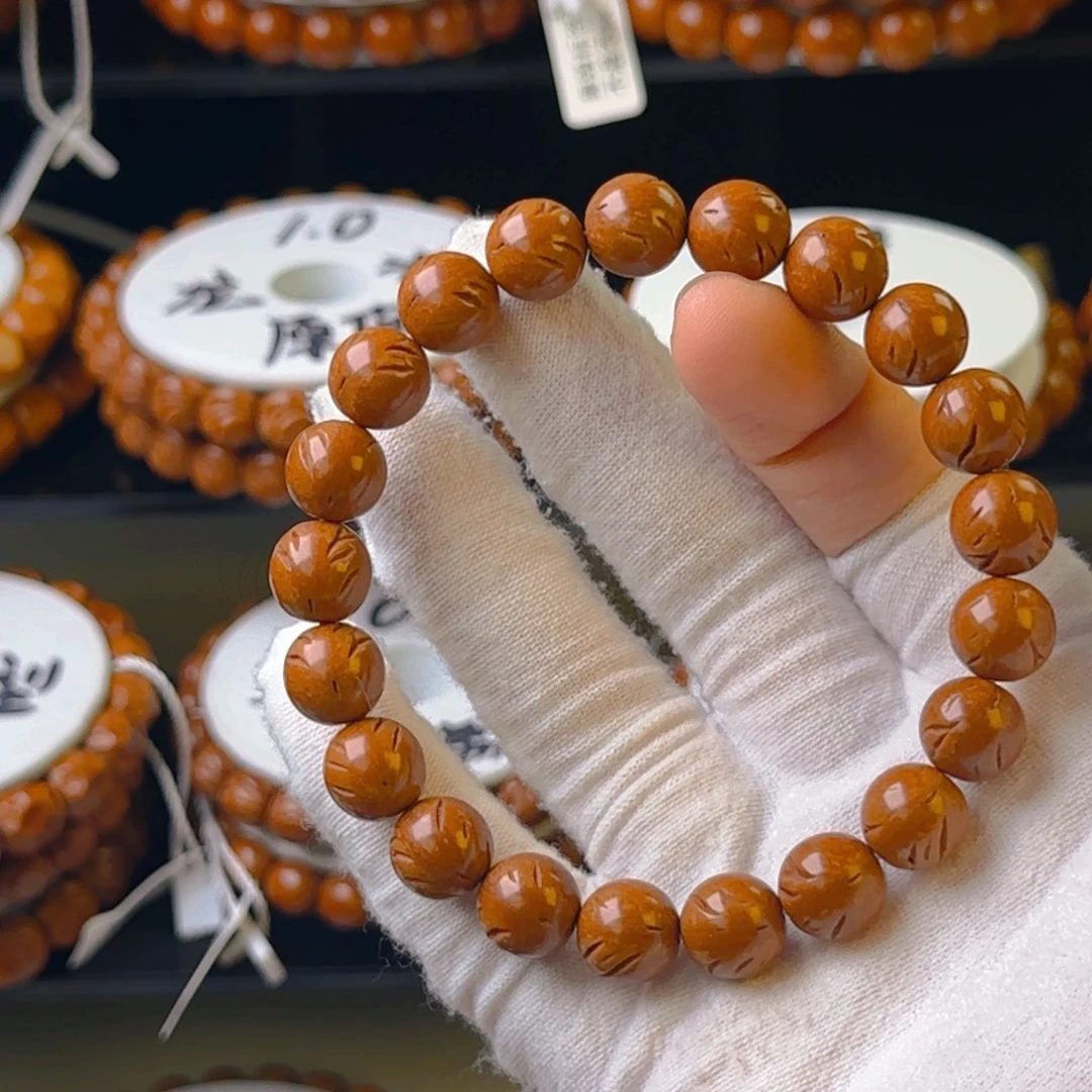 桃核手串龙纹桃核正圆光珠凤仙