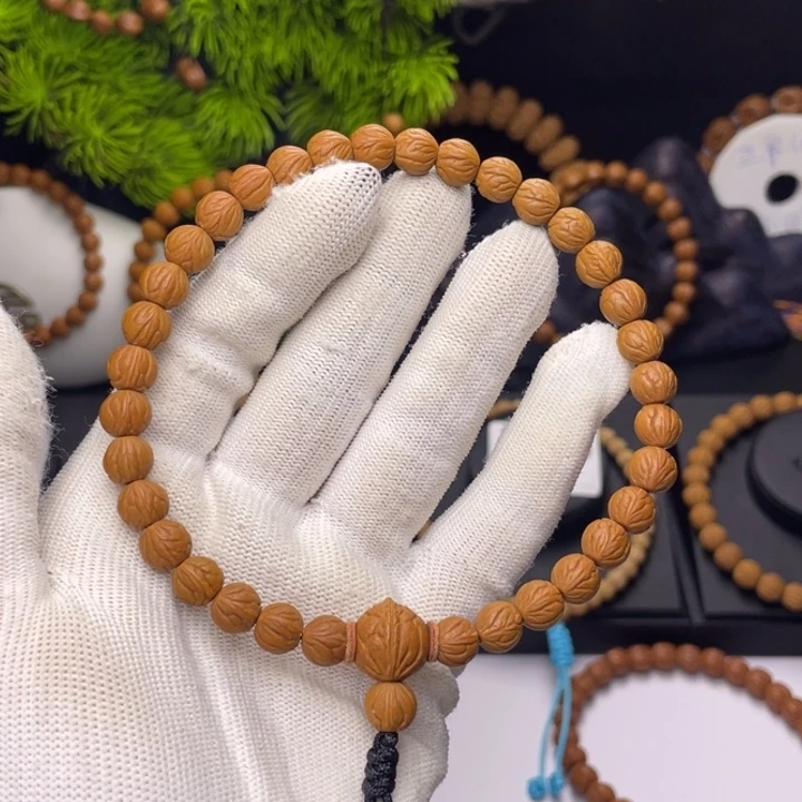 随***心桃核吊坠玉龙脊0.8