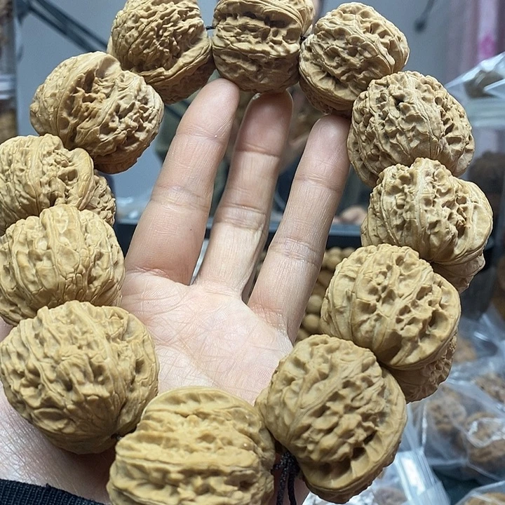 文玩核桃把件36白狮子手持