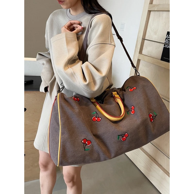 跨境行李包女轻便大容量斜挎运动健身包时尚高级感短途手提旅行包