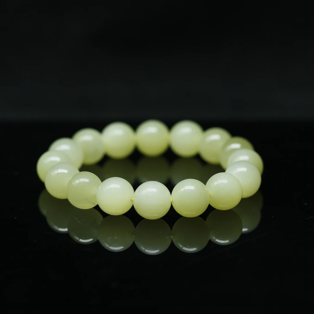 4和田玉若羌黄口手串/400033保利厦门拍卖