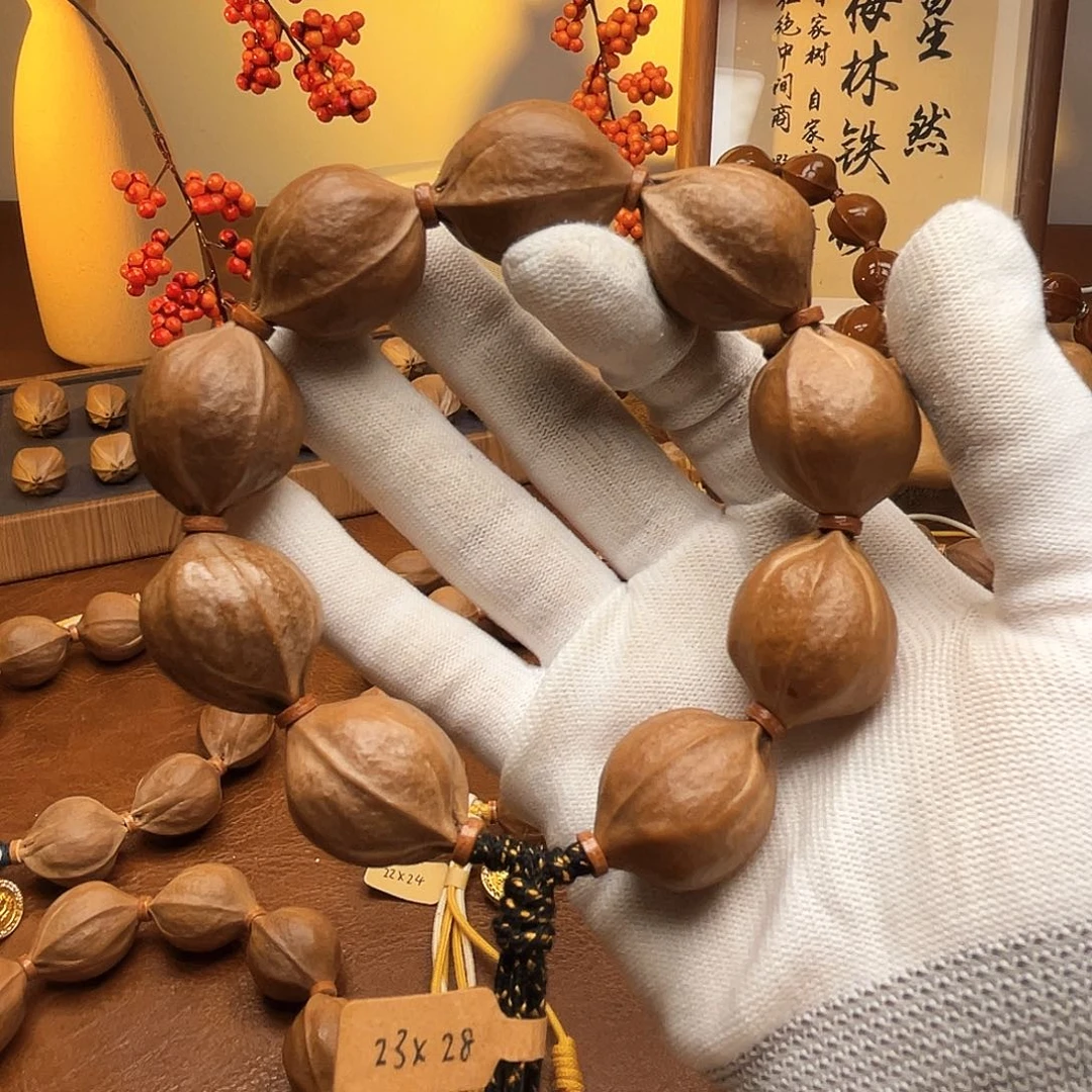 九***歌手串橄榄核梅林铁核23*28