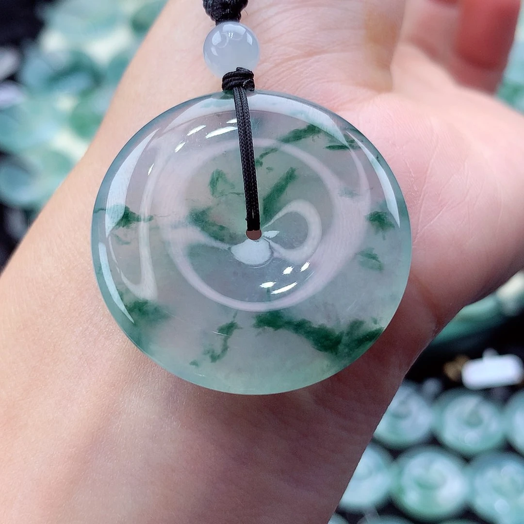 翡翠未镶嵌颈饰编号33。尺寸34.1-5.9