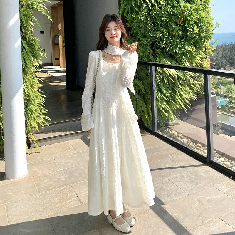 肌理感提花白色收腰连衣裙女春秋2025新款高级感绝美度假风仙女裙