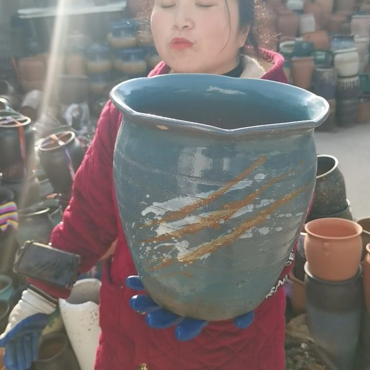 红陶口25高25瑕疵一个盆子