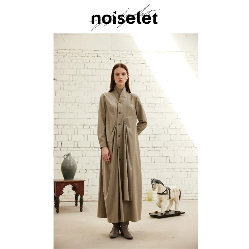 noiselet随性不对称斜插片修身长式风衣 N1249