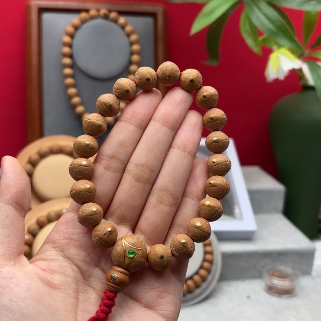 凤眼菩提手串12.5左右铜钉镶嵌手串