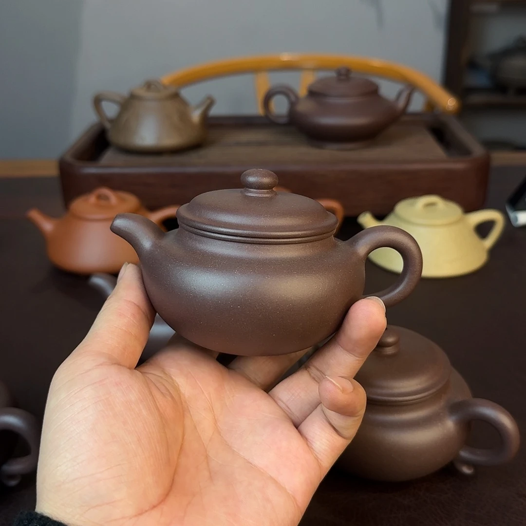 紫砂茶壶心**月紫砂壶茶具手工制作的话