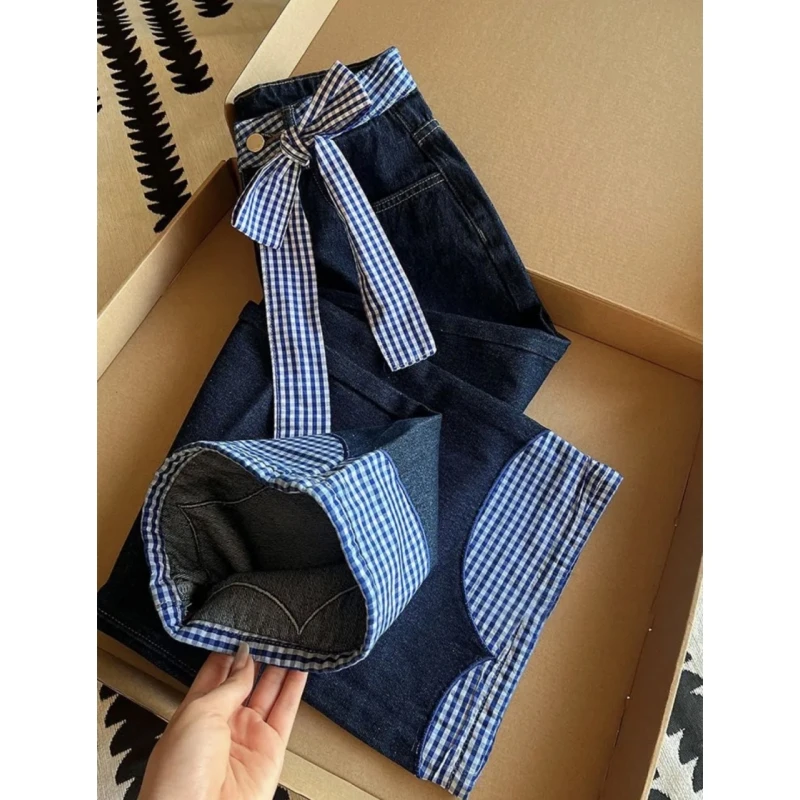 韩系高街拼接蝴蝶结绑带宽松牛仔裤女春季新款高腰阔腿拖地长裤子