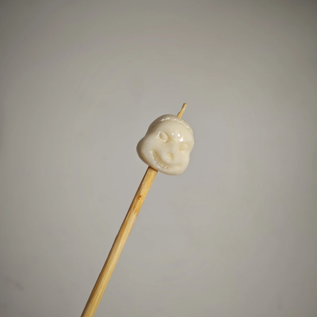 猛犸牙雕小阿呆配饰8*7mm单个随机发假一罚四W5089