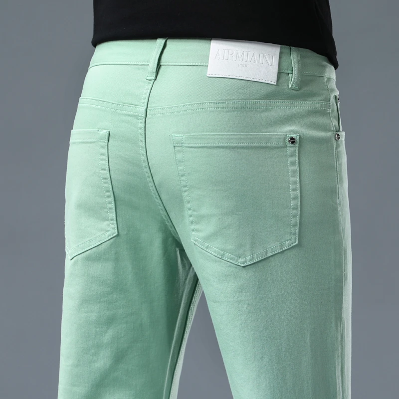 约文库费高端时尚春夏季男款牛仔裤修身直筒高级绿色休闲百搭长裤