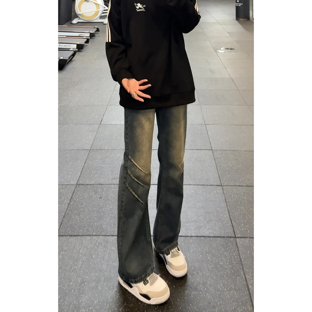 黑灰色解构弯刀牛仔裤男款秋季美式高街微喇裤子窄版修身直筒长裤