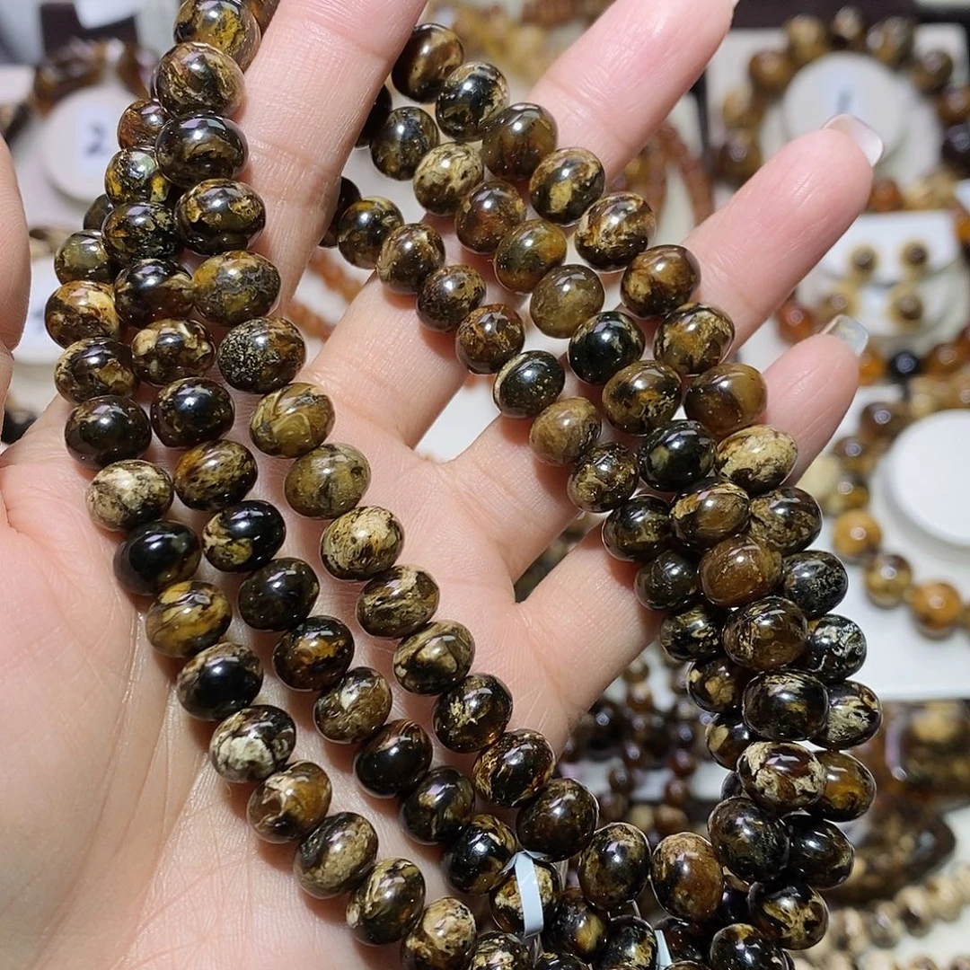 大***边琥珀未镶嵌裸石熊猫花9+