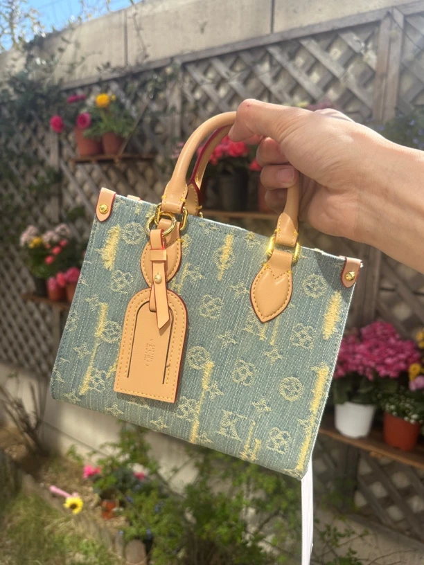 春夏新款丹宁手提小丛林