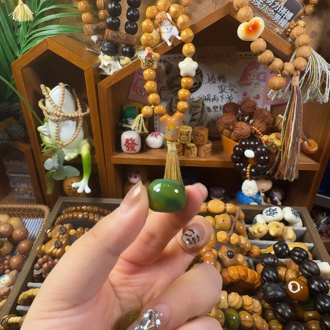 伍***婲桃核吊坠配饰一个