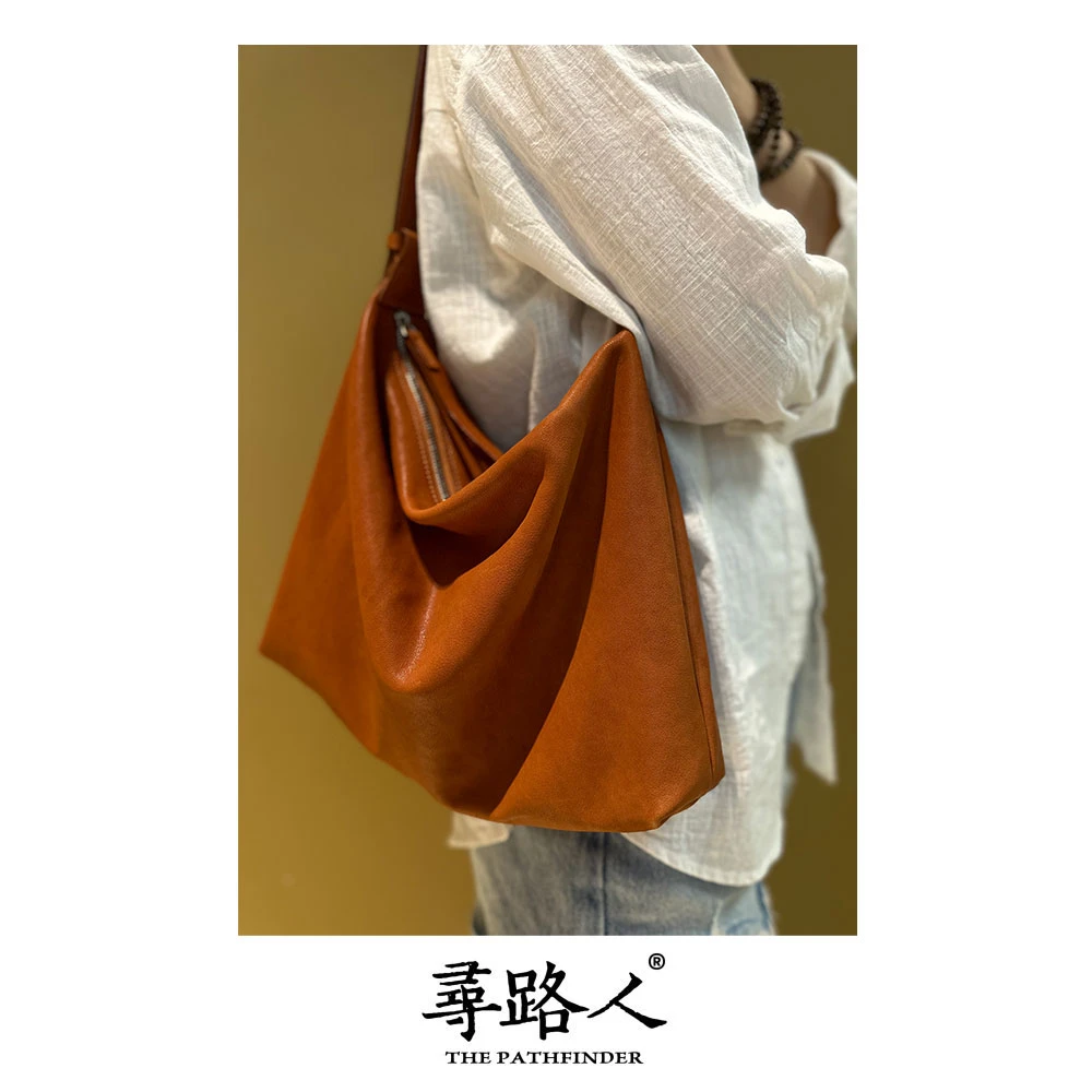 寻路人藏系列休闲小众简约质感纯色斜挎单肩包松松包