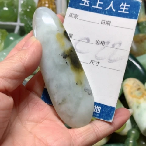 蛇纹石玉手把件未镶嵌煤***人