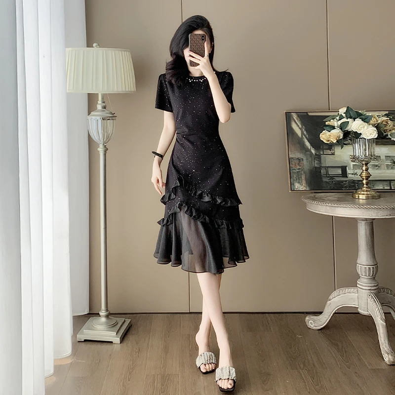 纳凡2025夏季超显瘦黑色气质连衣裙女收腰高级感不灵不灵闪裙子