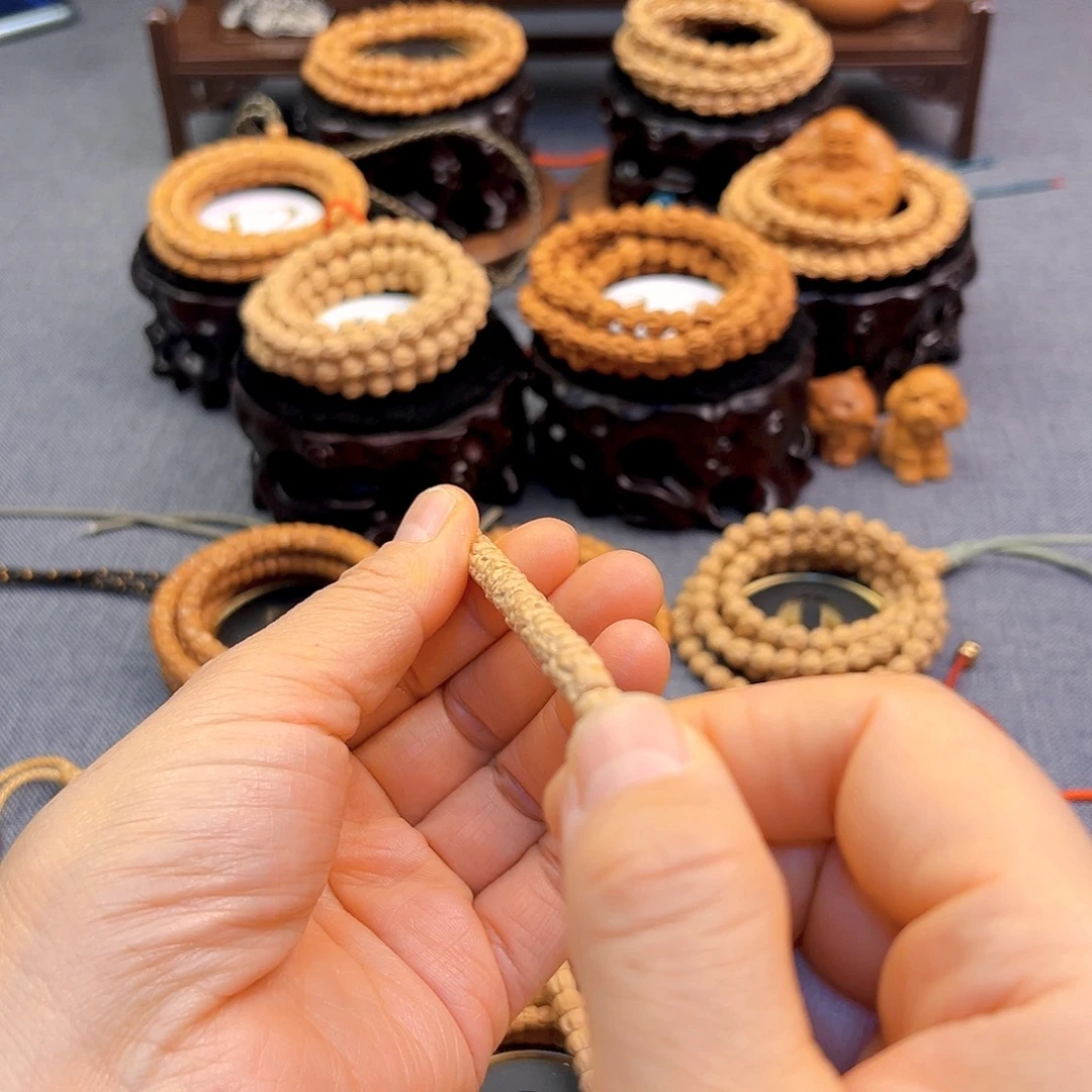 佳***宝柏香籽/百香籽手串