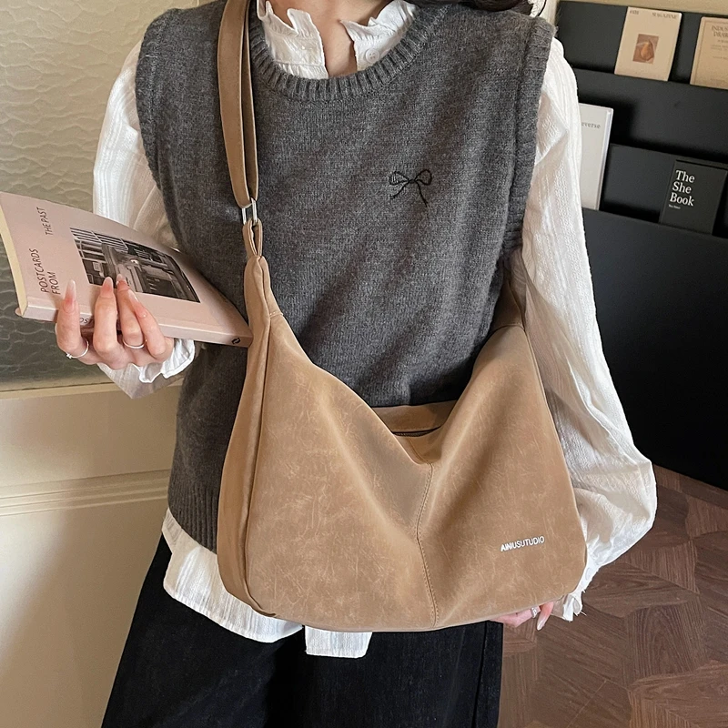 托特褶皱蝴蝶结斜挎包女士牛角单肩软软少女大容量托特包