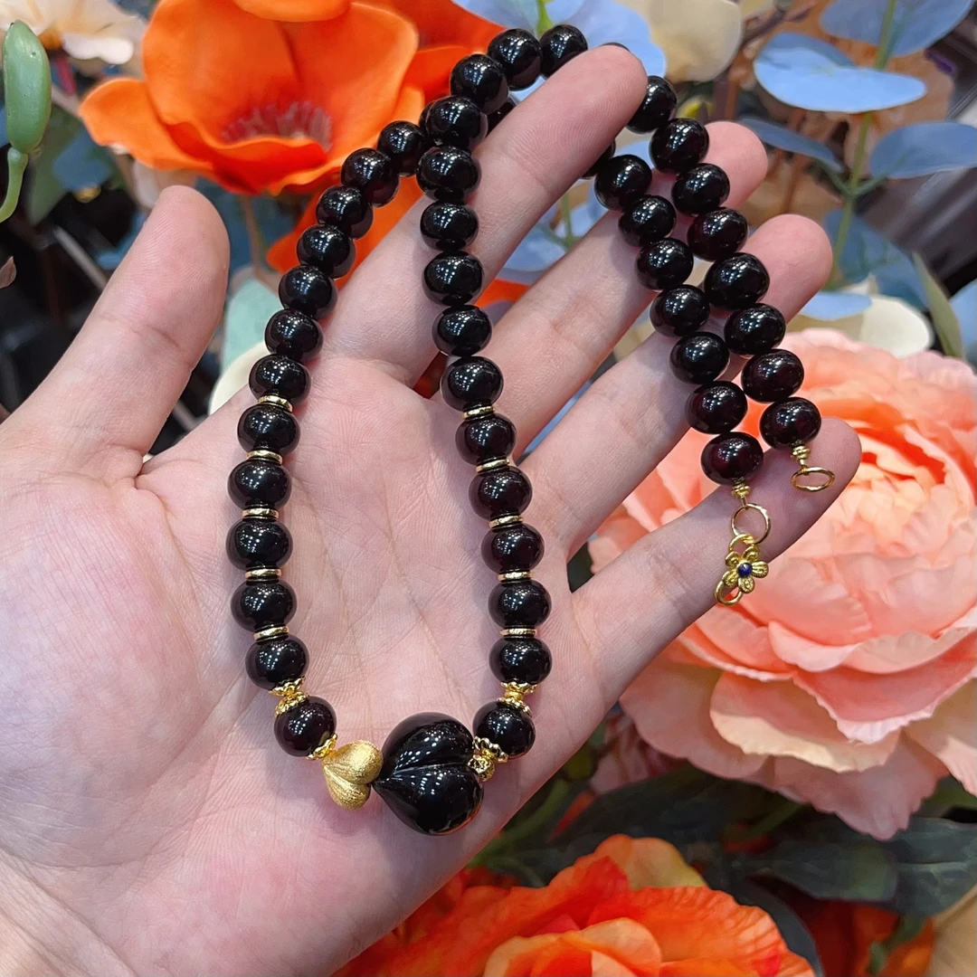 曼曼珠宝翳珀屁桃项链