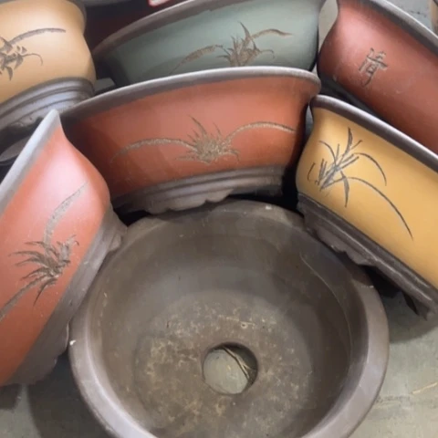 紫砂花盆100-7。          27-11