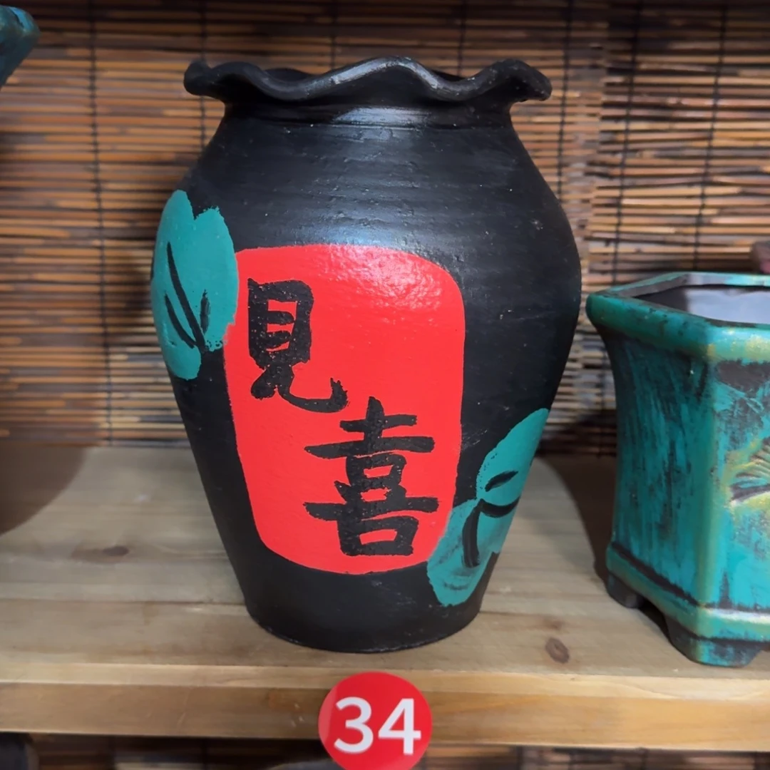 有孔红陶浮雕花盆炸炸炸