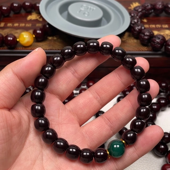 扎***文吊坠橄榄核猴头手串