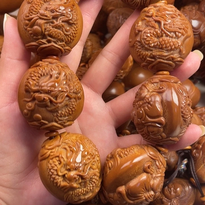 蔡***包吊坠橄榄核橄榄核手持