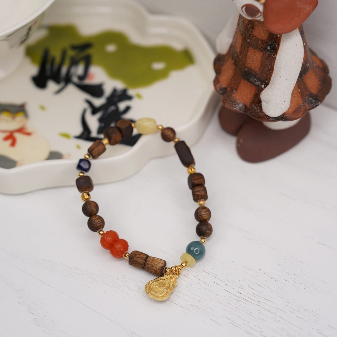 沉香拾壹.绿棋楠随形单圈手串