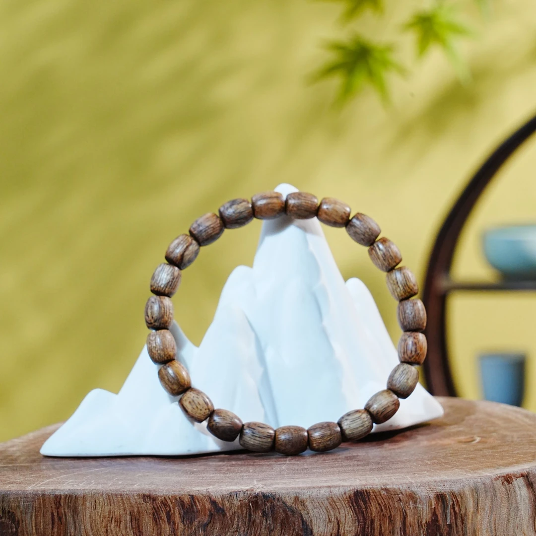 斯里兰卡熟结软丝蛇皮纹老料桶珠手串0.7x0.8cm4.6g 251111008 A