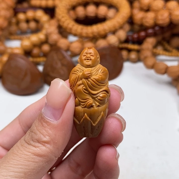 斌***橄榄核吊坠弥勒单子
