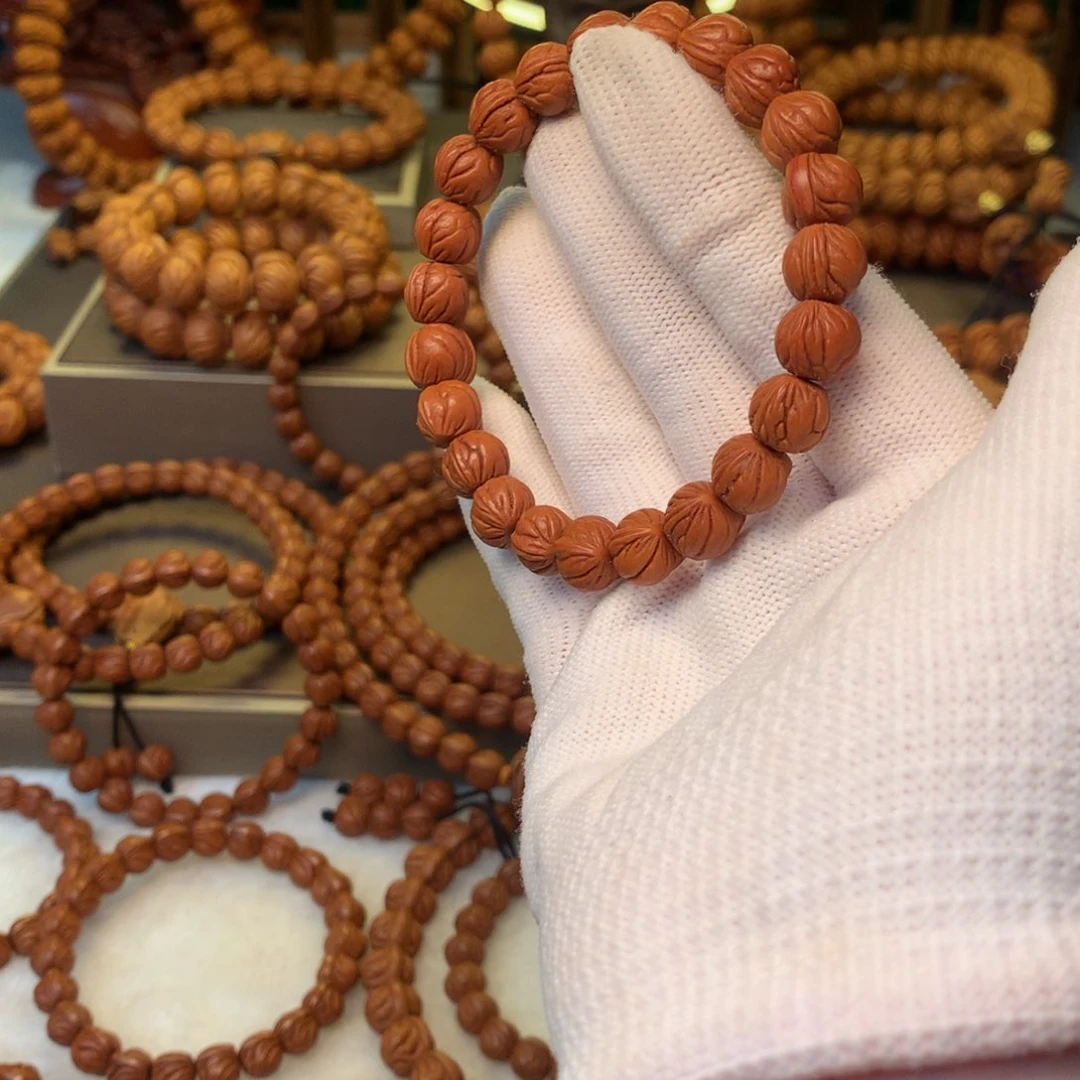 桃核手串空*?秦岭龙纹