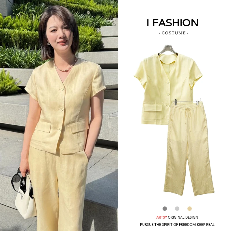 时尚气质套装女士2025夏季新款休闲拼接v领上衣松紧腰长裤两件套