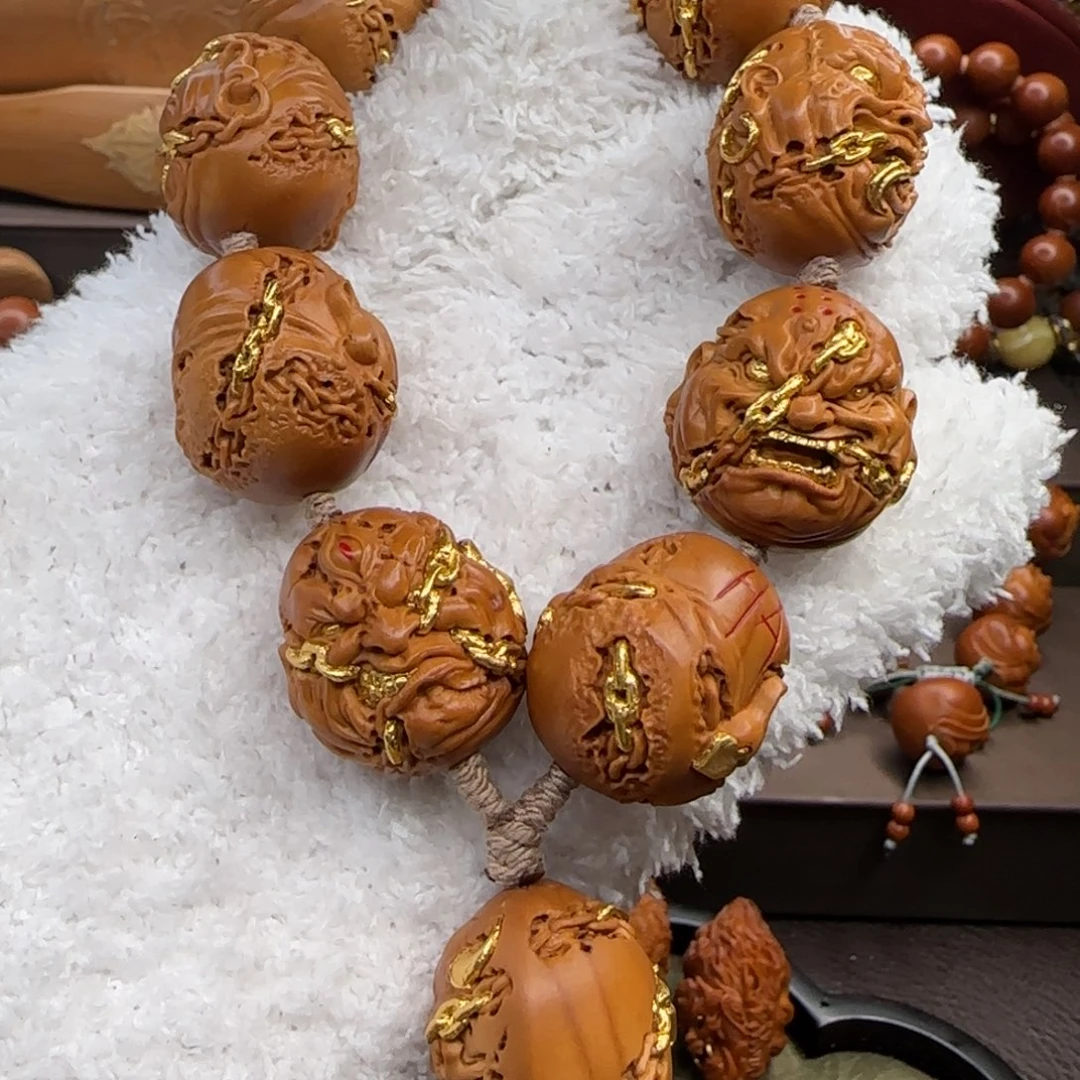 橄榄核把件2.4镶嵌铁链恶僧