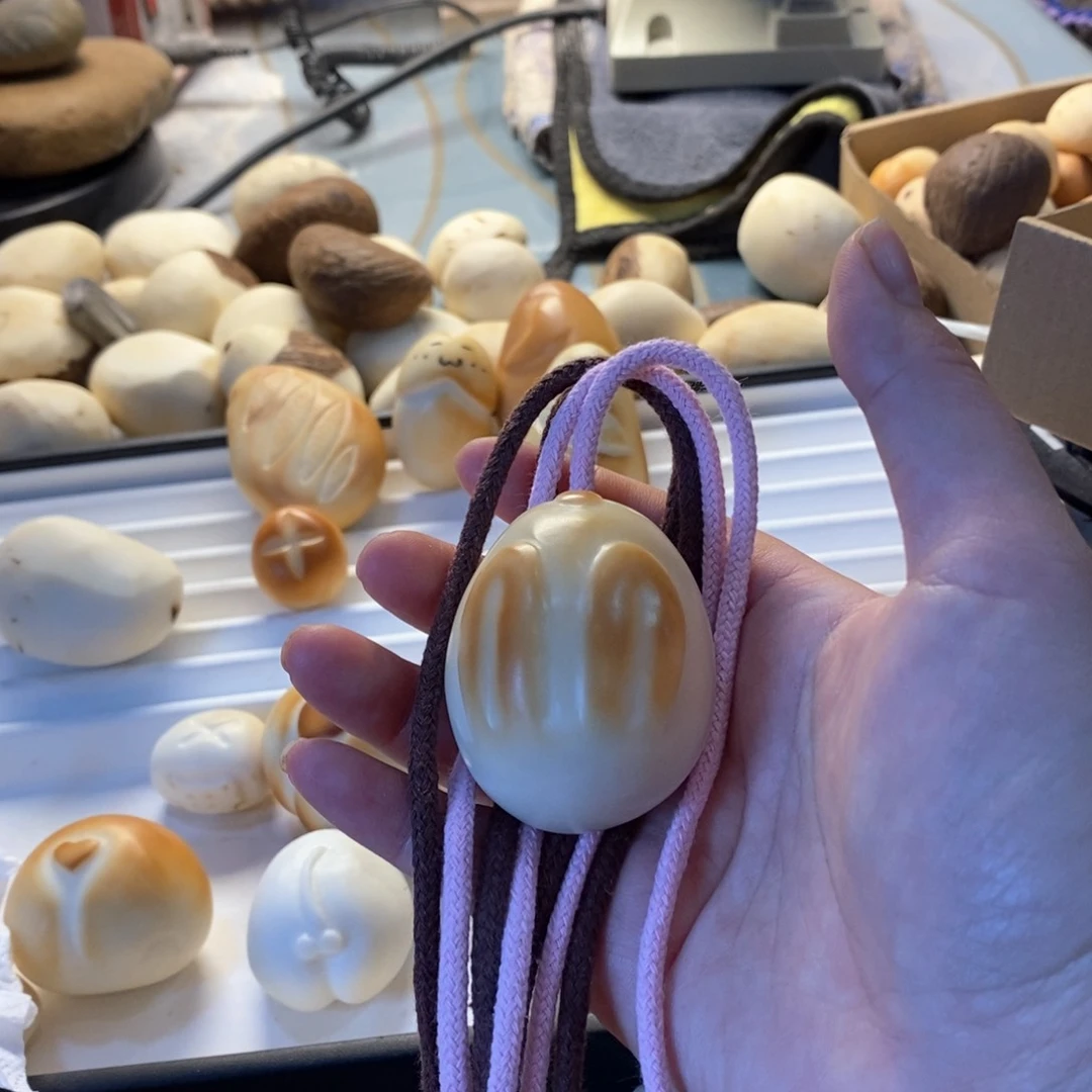 菩提根/象牙果把件文***?象牙果定制大兔兔打孔编绳