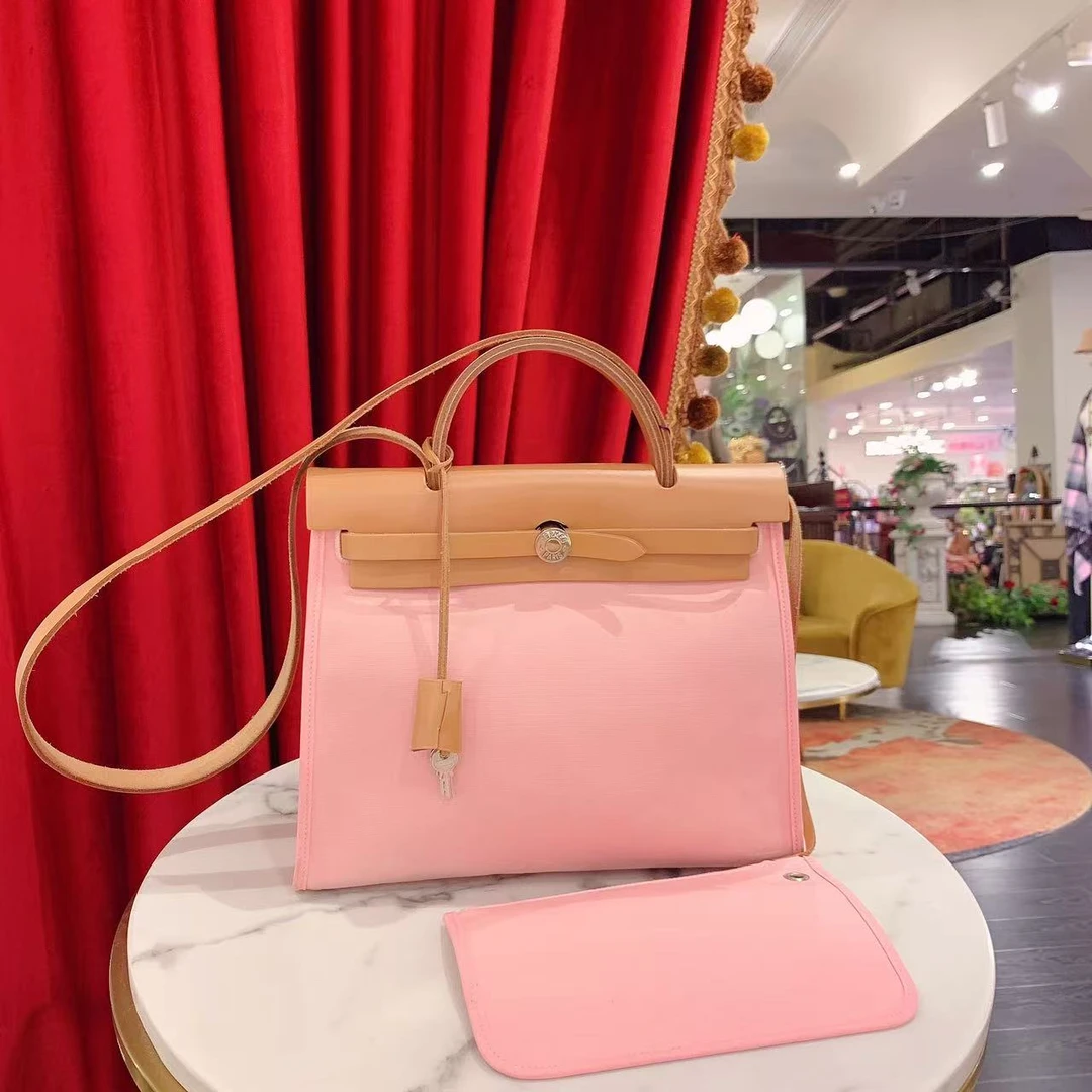 95新 Hermes/爱马仕 Herbag31樱花粉银扣帆布拼皮单肩包/60338128