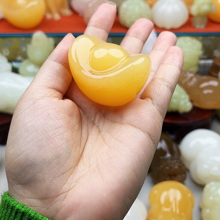 德***…石材元宝手把摆件