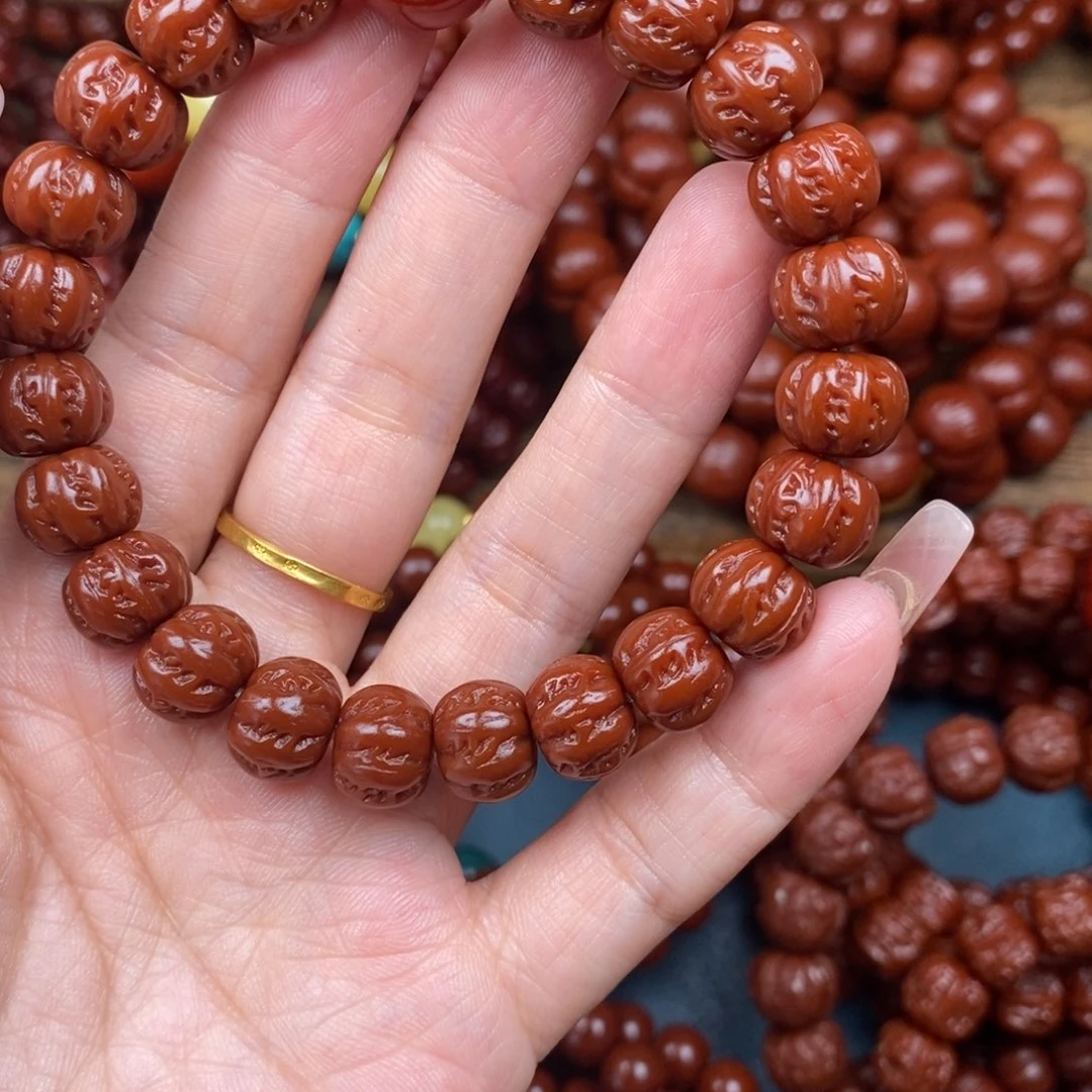 *****猴头核桃手串小八棱加红