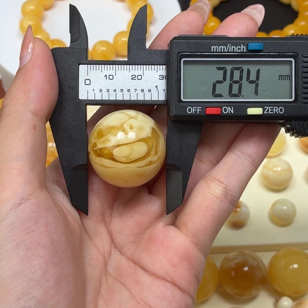 琥珀未镶嵌颈饰俄料浓蜡妖花溶洞眼睛单珠28.4mm