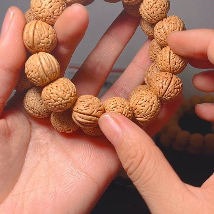 阿***尧桃核吊坠桃核手串