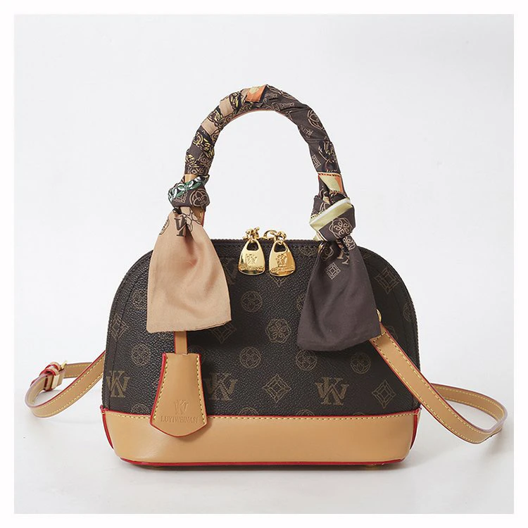 撞色棕色图案贝壳包斜跨复古单肩包枕头包潮流百搭手机包时尚轻奢