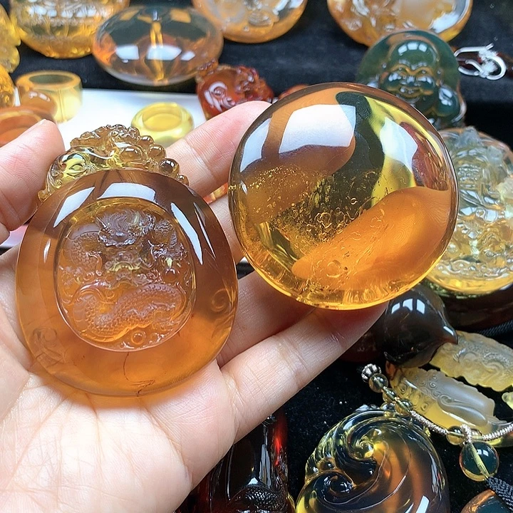 R***北琥珀未镶嵌裸石龙+圆扣吊坠