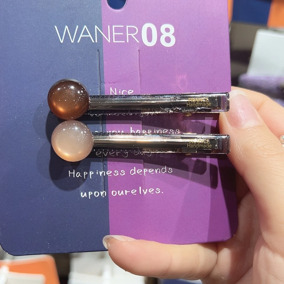 皮质铁合金豆豆拼色鸭夹