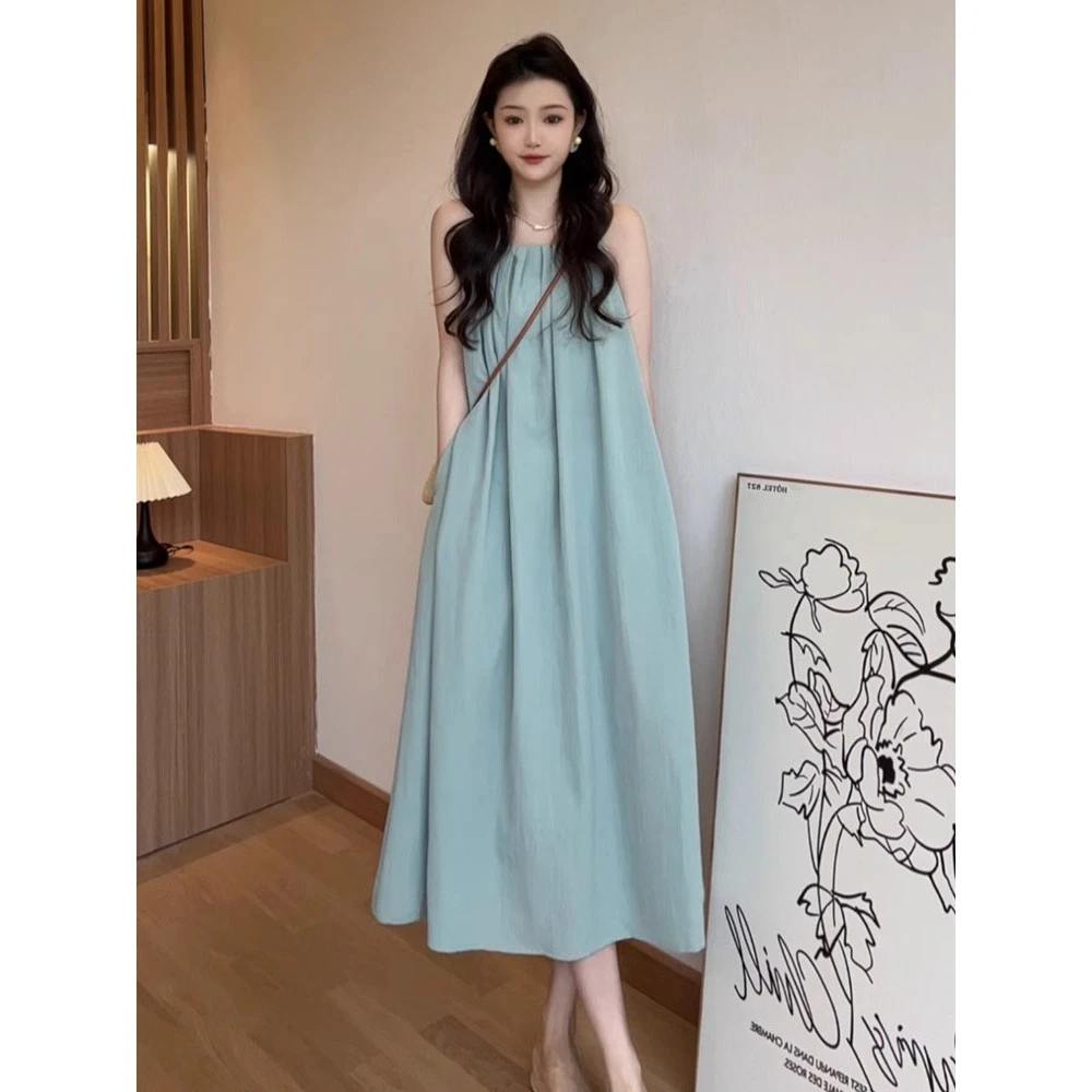 2025无袖背心连衣裙子女夏季2025新款海边度假高级感挂脖吊带沙滩