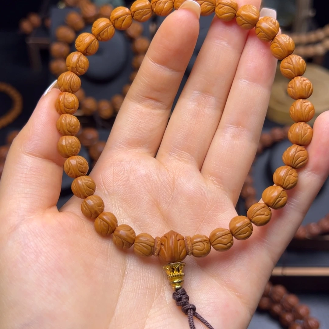 一***！桃核手串野生玉龙脊0.8