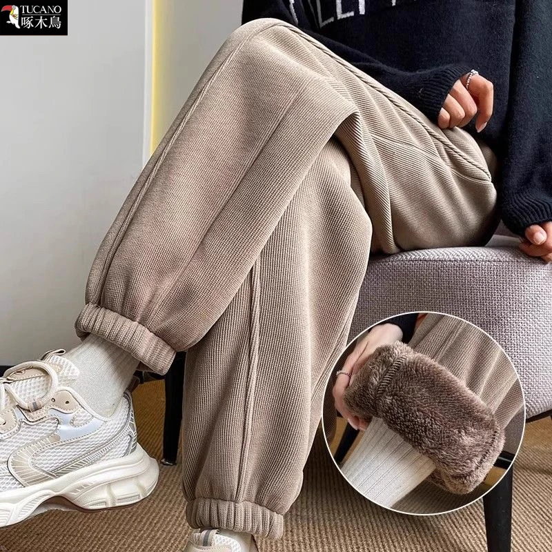 啄木鸟正品2025秋冬季哈伦裤保暖加绒加厚休闲显瘦小众百搭长裤女