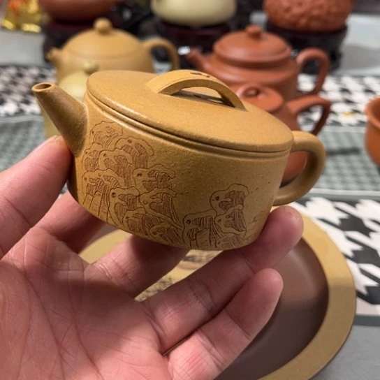 汉瓦瑕，壶底裂，容量一百二