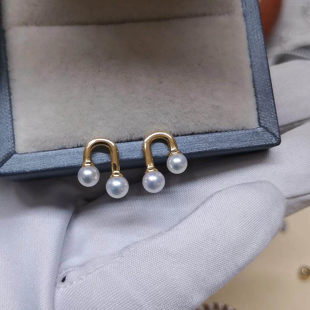 铁***姐银S925镀金镶嵌淡水珍珠耳饰